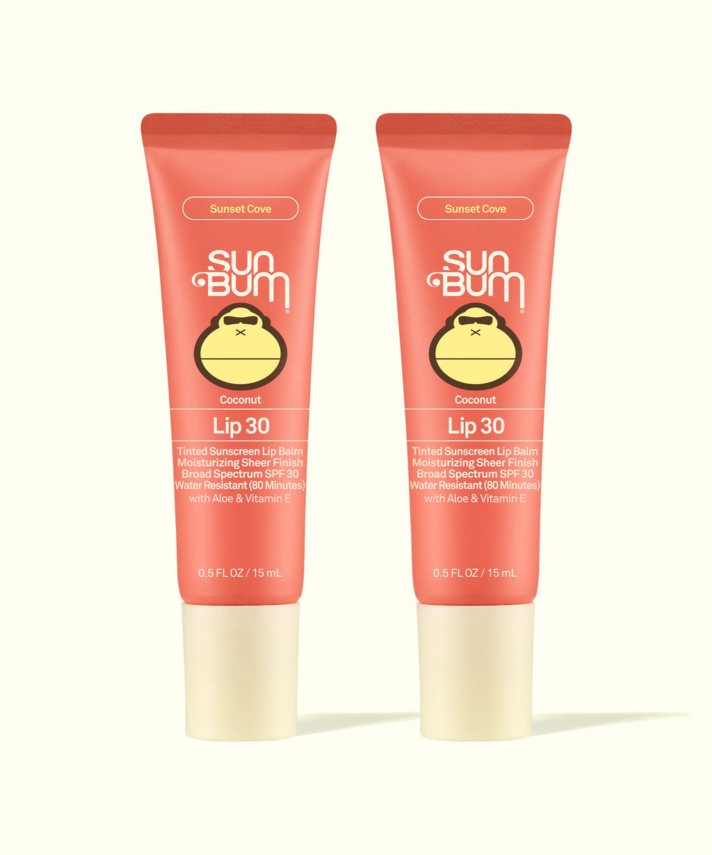 Two Sun Bum Sunset Cove Coconut Lip 30 tinted sunscreen lip balms in coral packaging, part of Tinted Lip Duos