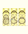 Sun Bum Air Freshener Bundle showing three yellow air fresheners with dice, banana, and monkey face designs.