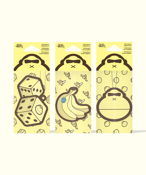 Sun Bum Air Freshener Bundle showing three yellow air fresheners with dice, banana, and monkey face designs.